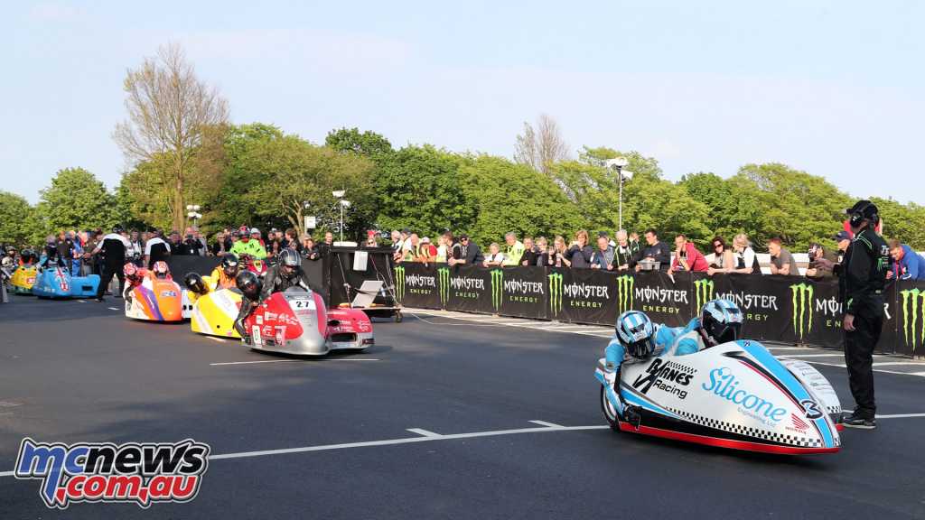 Sidecars heading out for their controlled speed lap