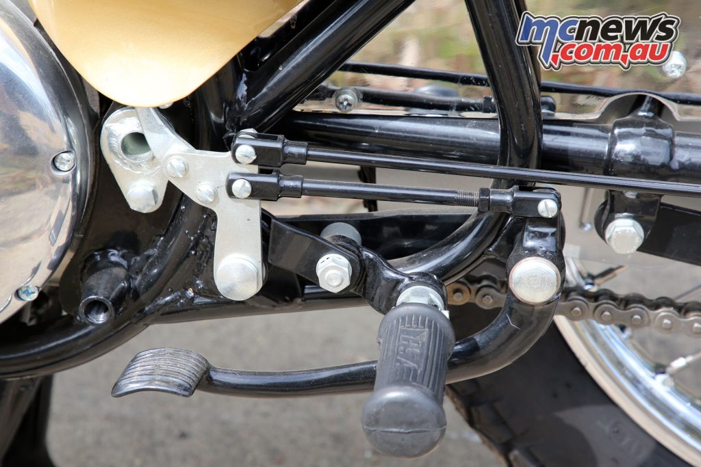 The rear brake also has an additional link to work with the rear footpegs
