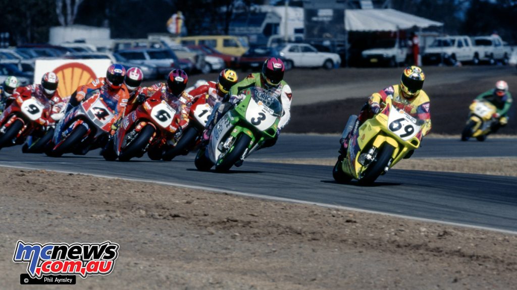 Benn Archibald leads the pack into Turn 1 on the opening lap