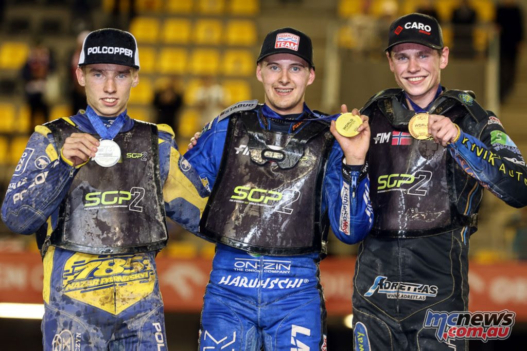 2024 SGP2 top trio - champion Wiktor Przyjemski (centre), second-placed Nazar Parnitskyi (left) and third-placed Mathias Pollestad (right) - Image by Jarek Pabijan