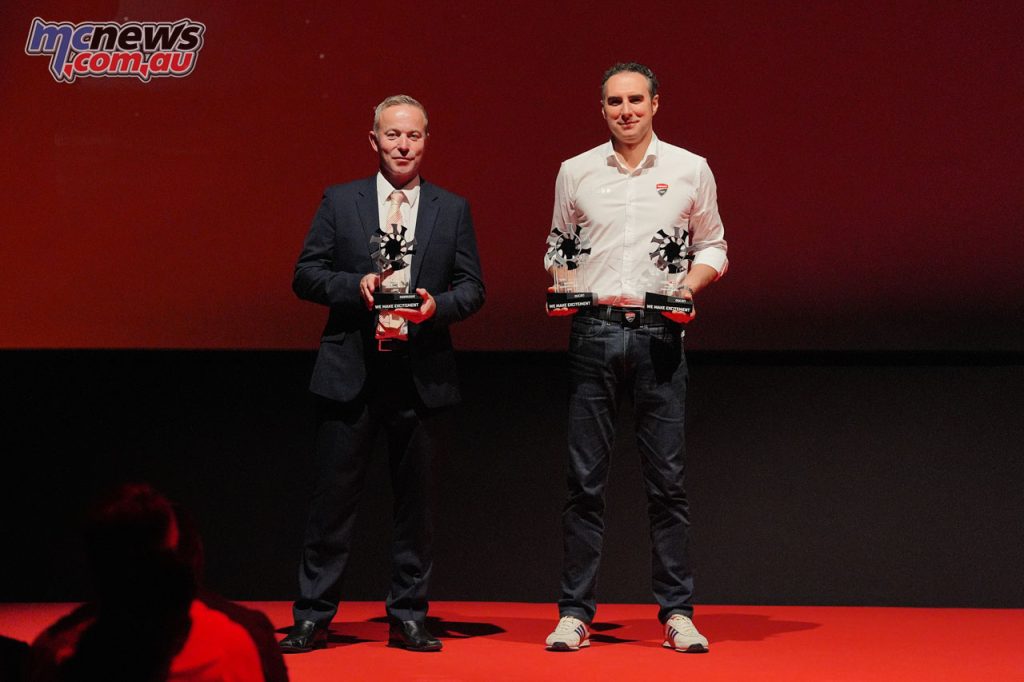 Marco Zambenedetti, Ducati Corse Technical Coordinator and Steve Guttridge, N.V. Race Planning Manager, Kawasaki Motors Europe, celebrate Ducati and Kawasaki’s achievements in the Manufacturer's World Championships.